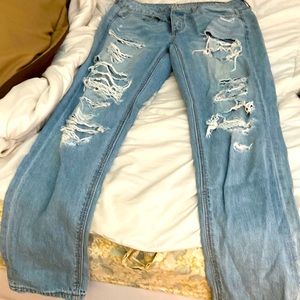 American Eagle Outfitters button-fly size 4 “Tomgirl” jeans. Faded, distressed.